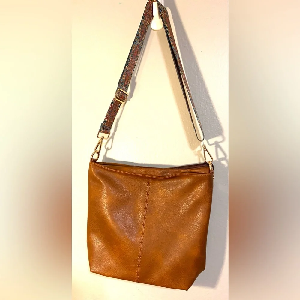 NWOT Hobo bag. Natural brown with colorful fabric adjustable strap.
